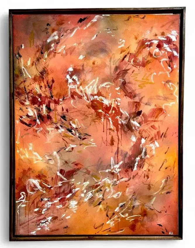 Painting called "Phoenix" in swirling shades of red and orange.